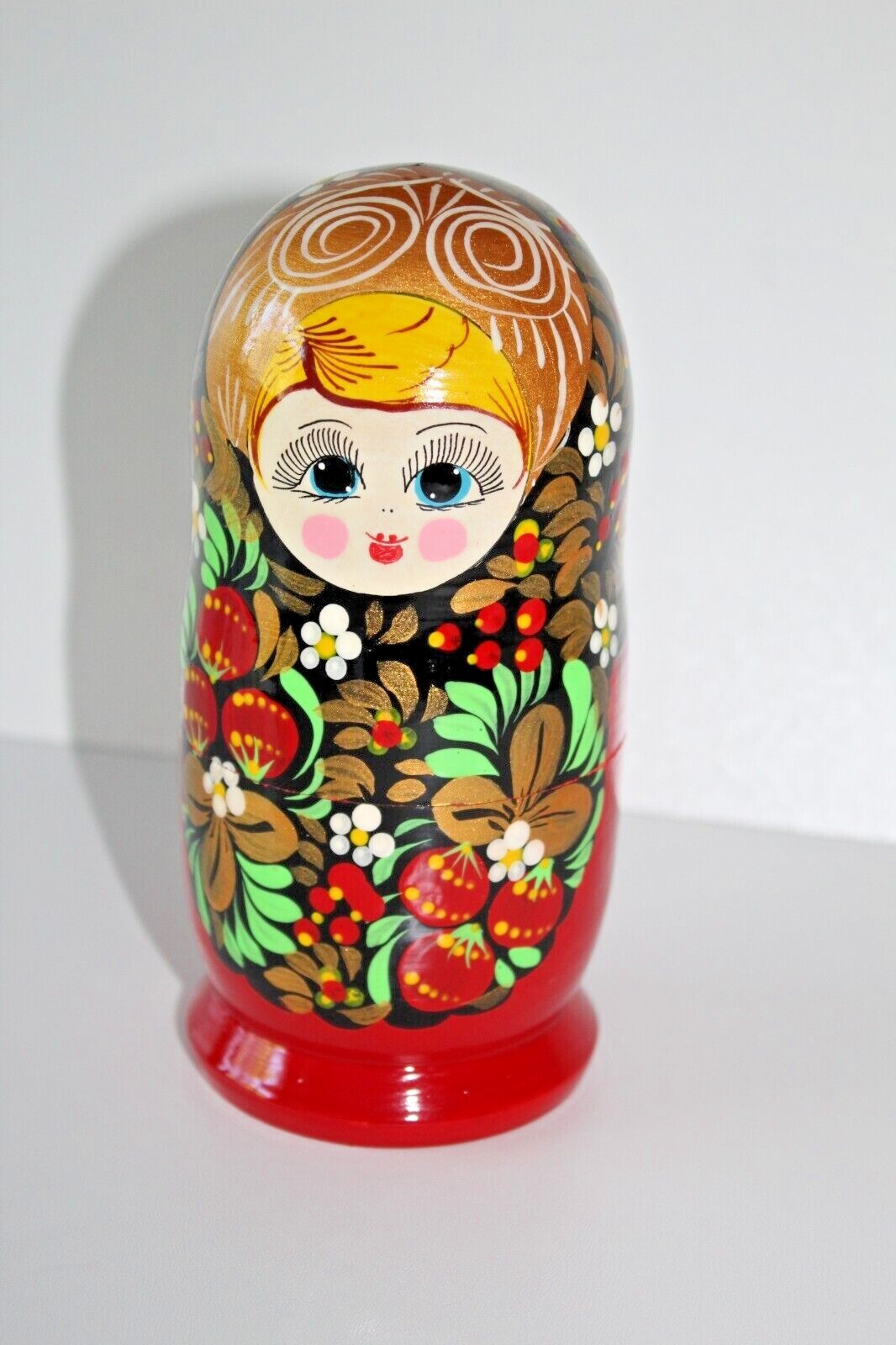 Traditional hand painted wooden Russian doll Multicoloured Single one