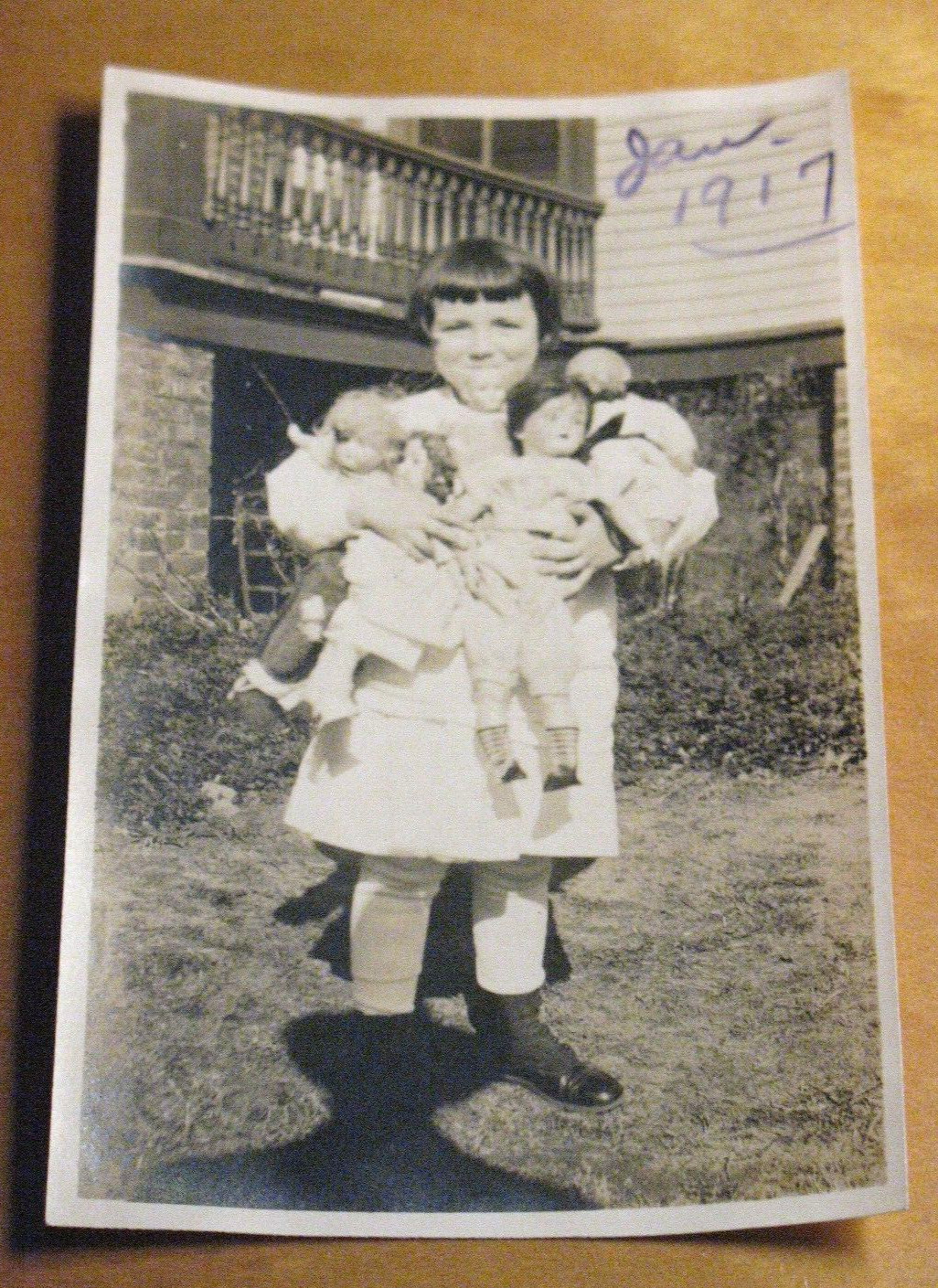 Little Girl Holds Arm Full Antique Dolls Pre World War One Snapshot Photo
