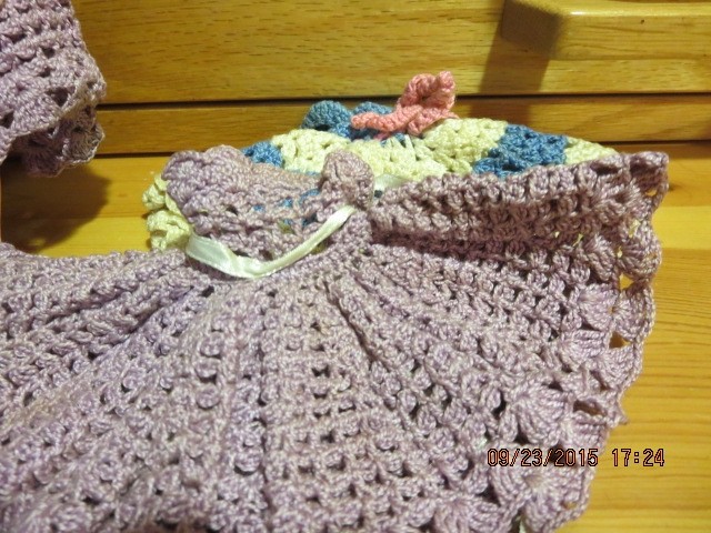 2 VINTAGE 7 1/2″ DOLLS WITH 6 HAND CROCHET DRESSES–#T 4A-7