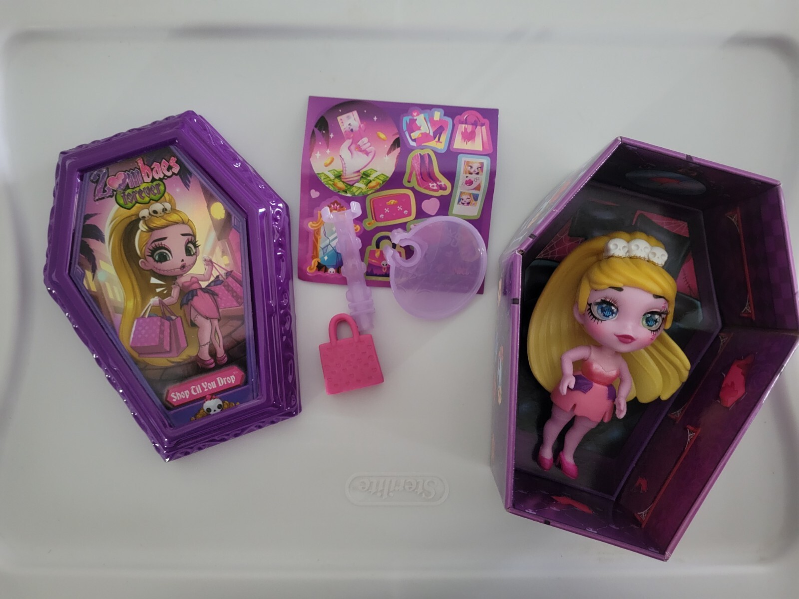 Zombaes Forever Doll 3.5in SHOP TIL YOU DROP, New, Opened Box