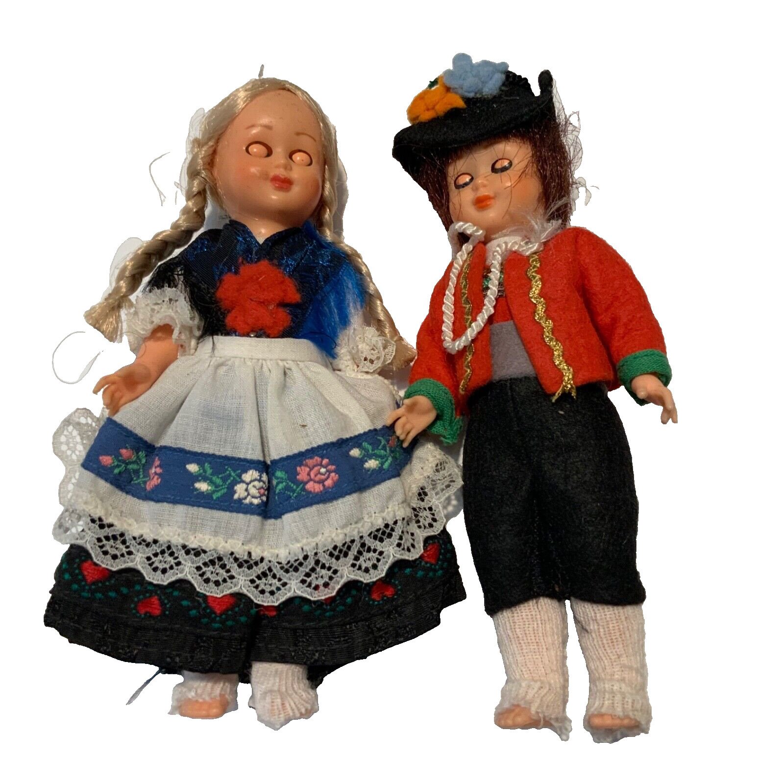 Vintage German boy and girl dolls. Both 6″ tall sleepy eyes plastic outfits