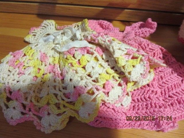 2 VINTAGE 7 1/2″ DOLLS WITH 6 HAND CROCHET DRESSES–#T 4A-7