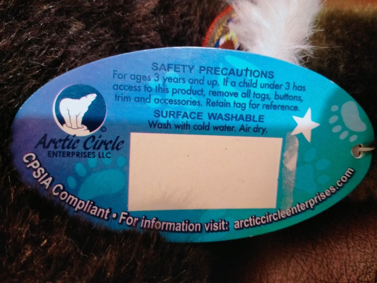 Plastic doll with a sign (Environmentally friendly) With a dense fabric body.