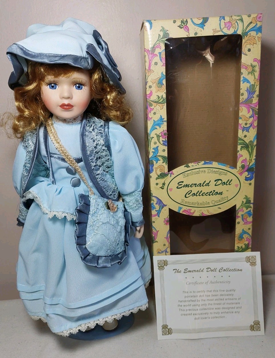 VTG Emerald Doll Collection Porcelain Doll 16″ w/ Stand Blue Eyes Dark Hair