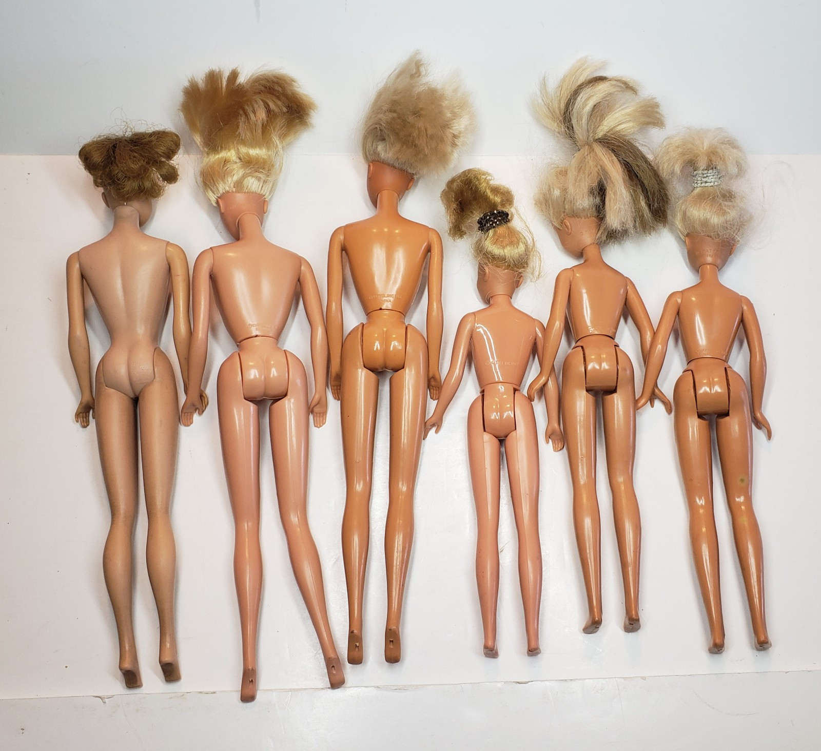 Barbie Lot: (2) 1966 Barbies, (1) 1958 Midge, (1) 1967 And (2) 1987 Skippers