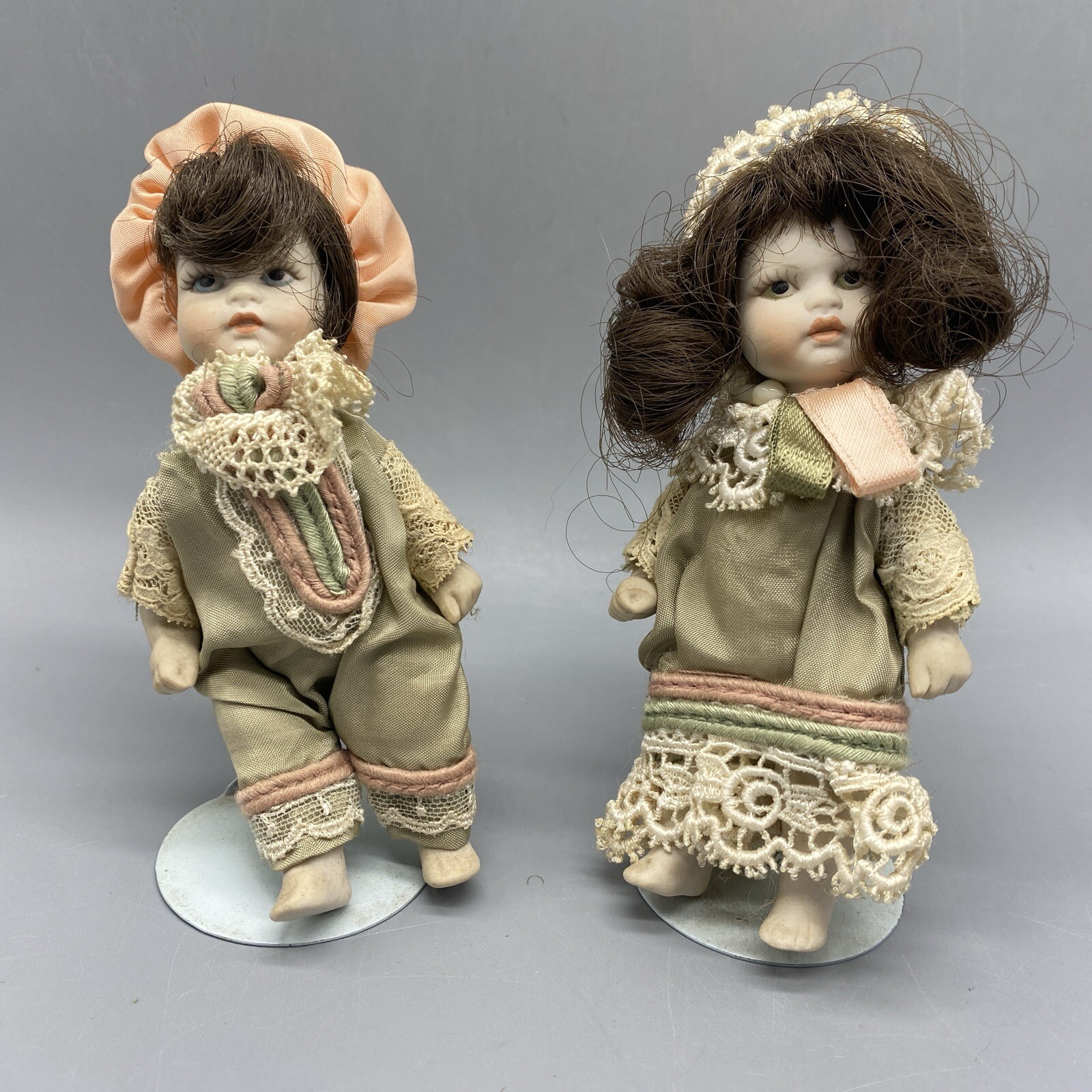 Le Bambole Di Arianna Porcelain Bisque Boy and Girl Twin Dolls & Stands