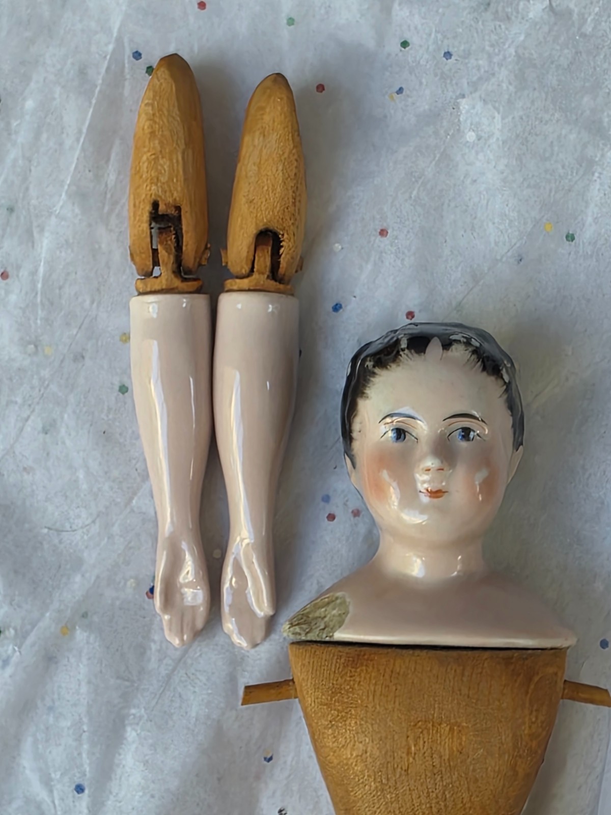Antique German China head doll 9″5/8 tall wooden doll