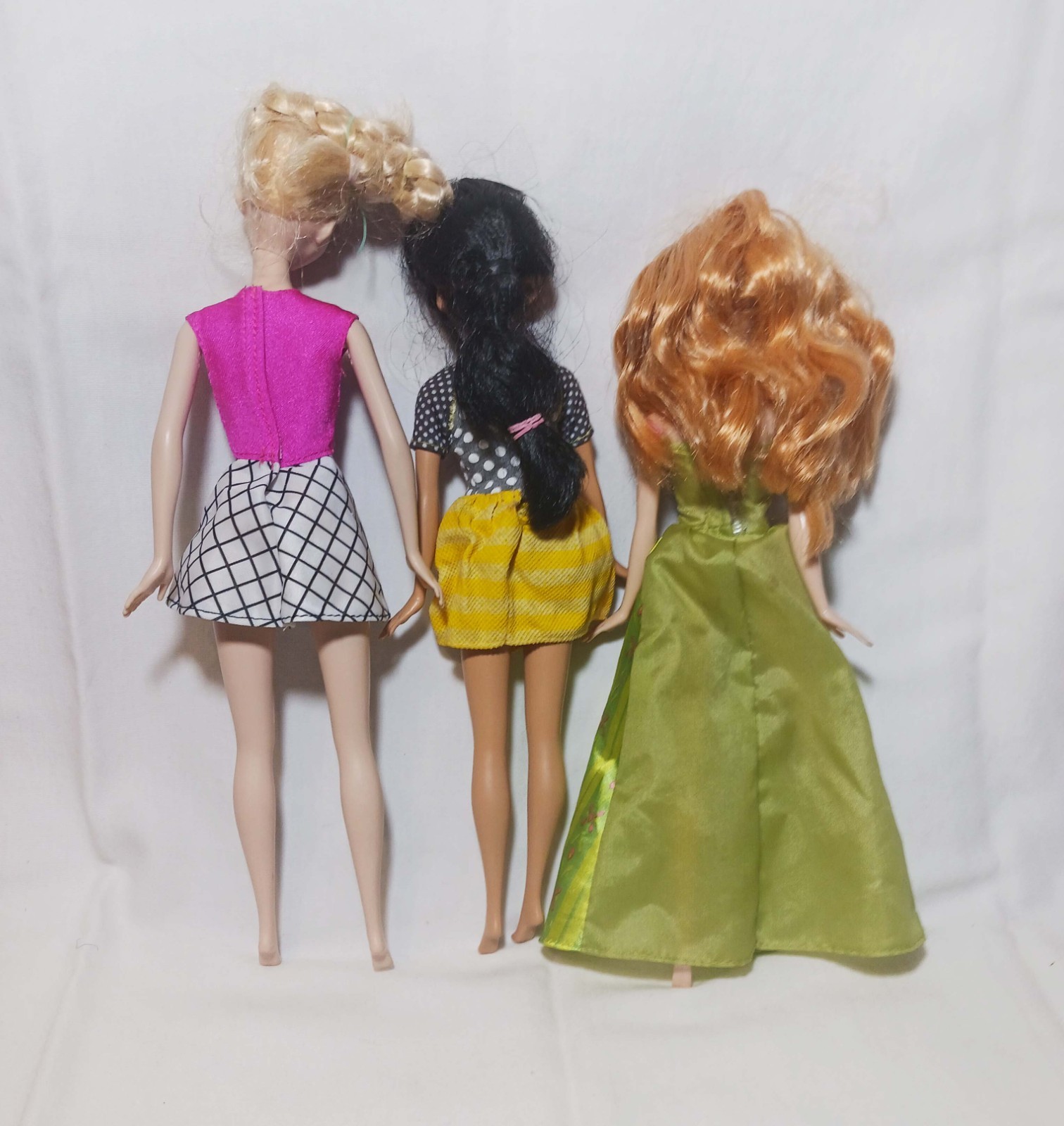 Various Lot of (3) Random Size Mattel Dressed Girl Dolls Clothes Included