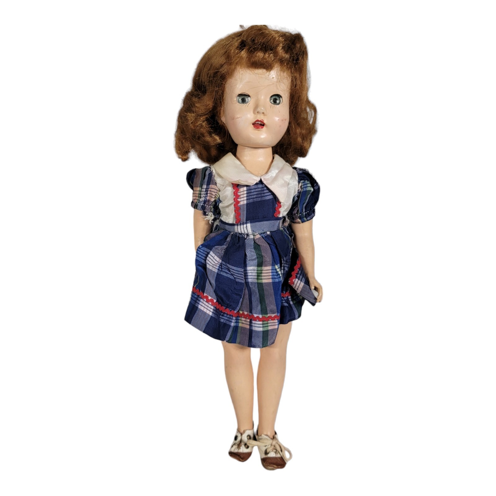 13.5″ 1950’s doll  very good condition. Beautiful face. Open mouth with teeth.