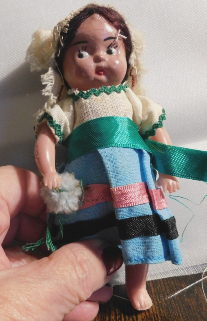 VINTAGE RAG, CLOTH PLASTIC ETHIC MEXICAN GIRL DOLL WEARING DRESS 5-1/2″