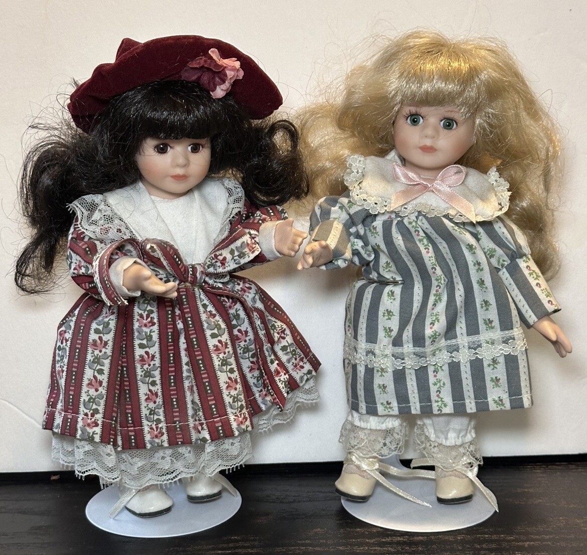 Two Piece Vintage 8” Porcelain Dolls W/ Stands Cloth Bodies Glued Wigs Eyelashes