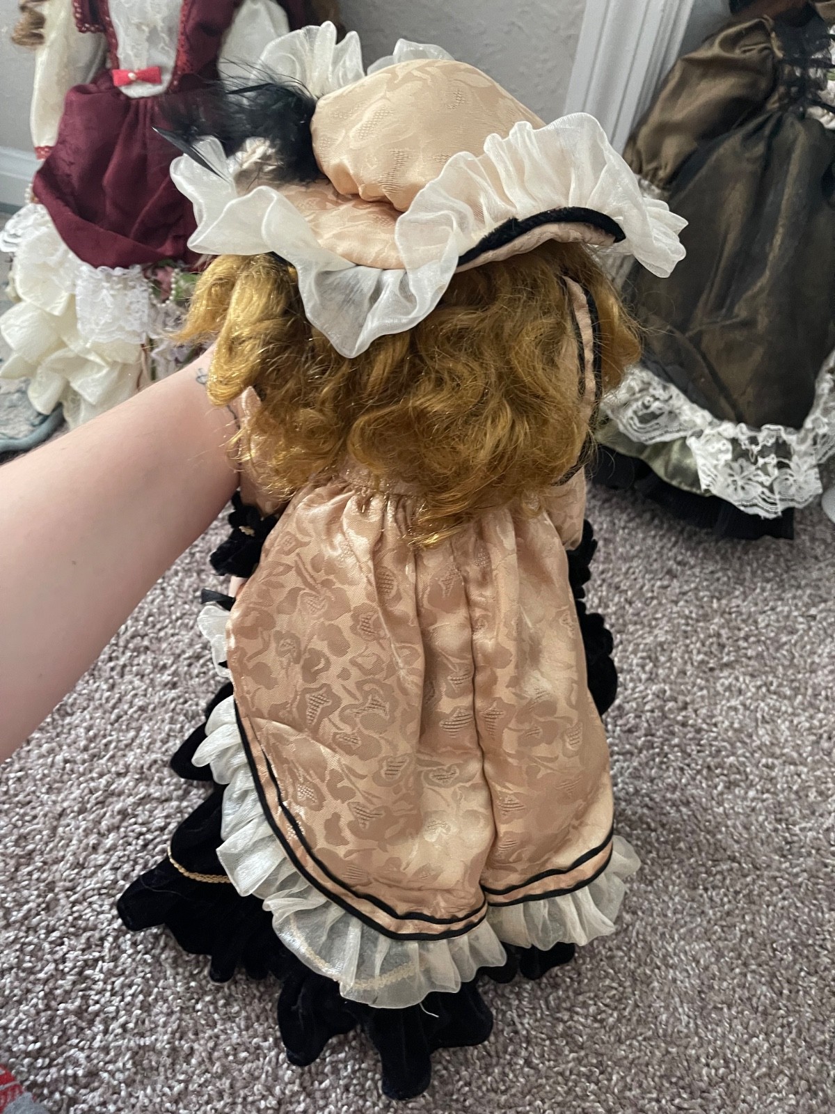 Early 2000s Emerald Doll Collection collectible porcelain doll named “CORA”, 18″