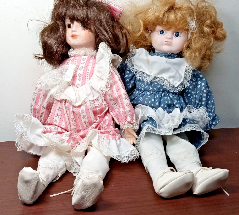 Beautiful Vintage Porcelain Dolls Brown and Blonde Hair Pink and Blue Dresses
