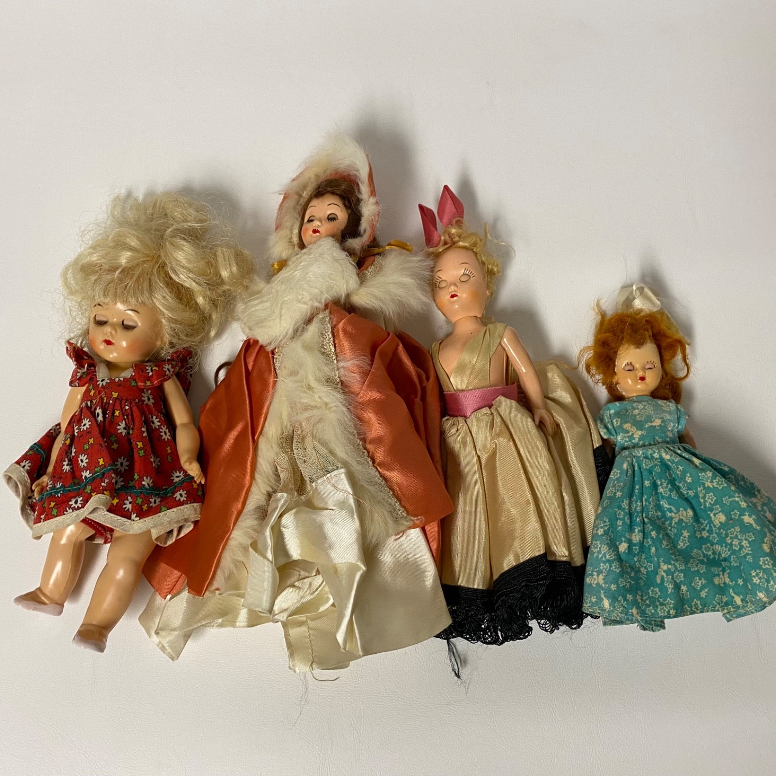 Lot of 4 Vintage Dolls Plastic • Painted Eyelashes • Small 6-10″ • Dresses