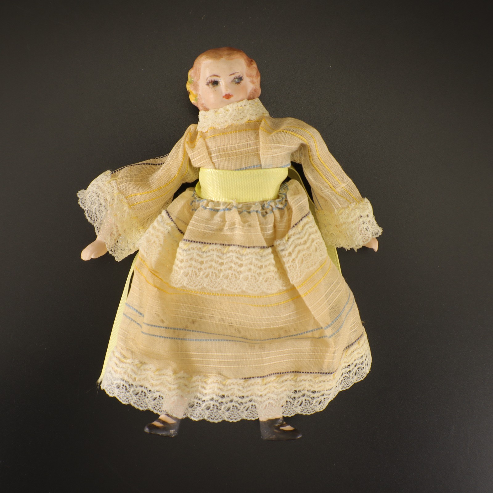 Small Porcelain Doll Plush Body Painted Face Yellow Ribbon 4.75″ Vintage