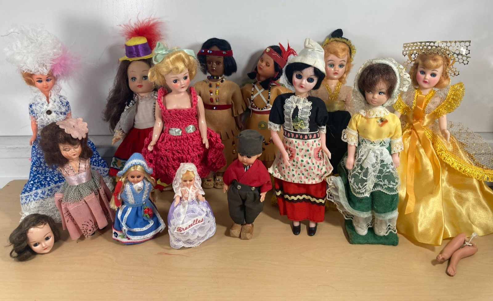 Vintage lot of sleepy eyed International European souvenir dolls of the world