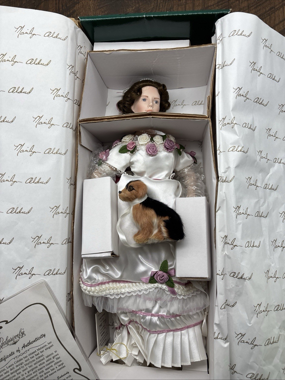 Exclusively yours MELANIE 16 inch porcelain doll in a gown with her pet dog