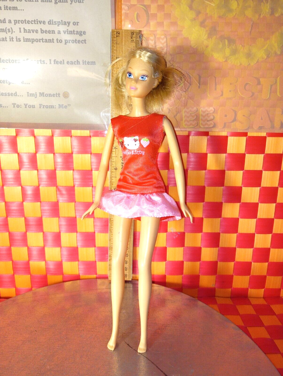 Doll, Barbie doll, Hello Kitty Barbie in outfit, 12″ tall as presented