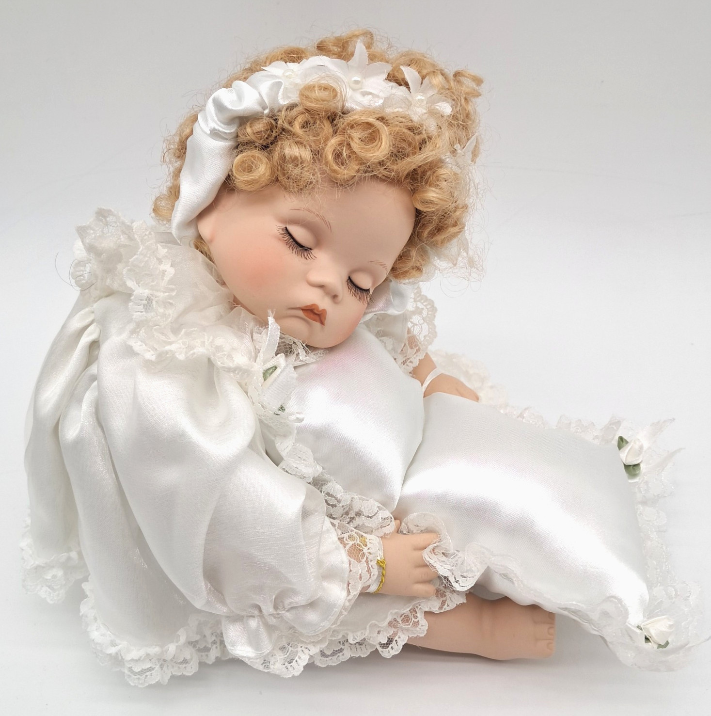 Vintage Emerald Doll Collection Porcelain Sleepy Baby Doll White Satin w/ Pillow