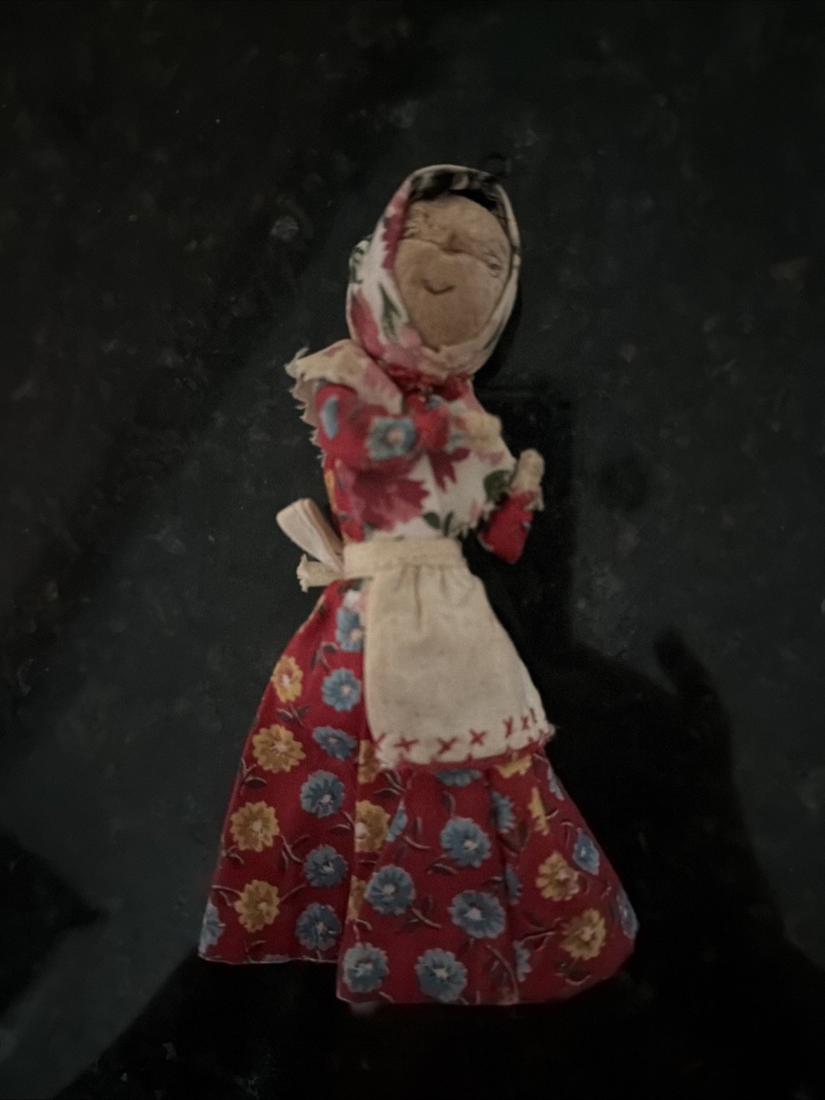 Vintage Doll, Face is painted on a Walnut