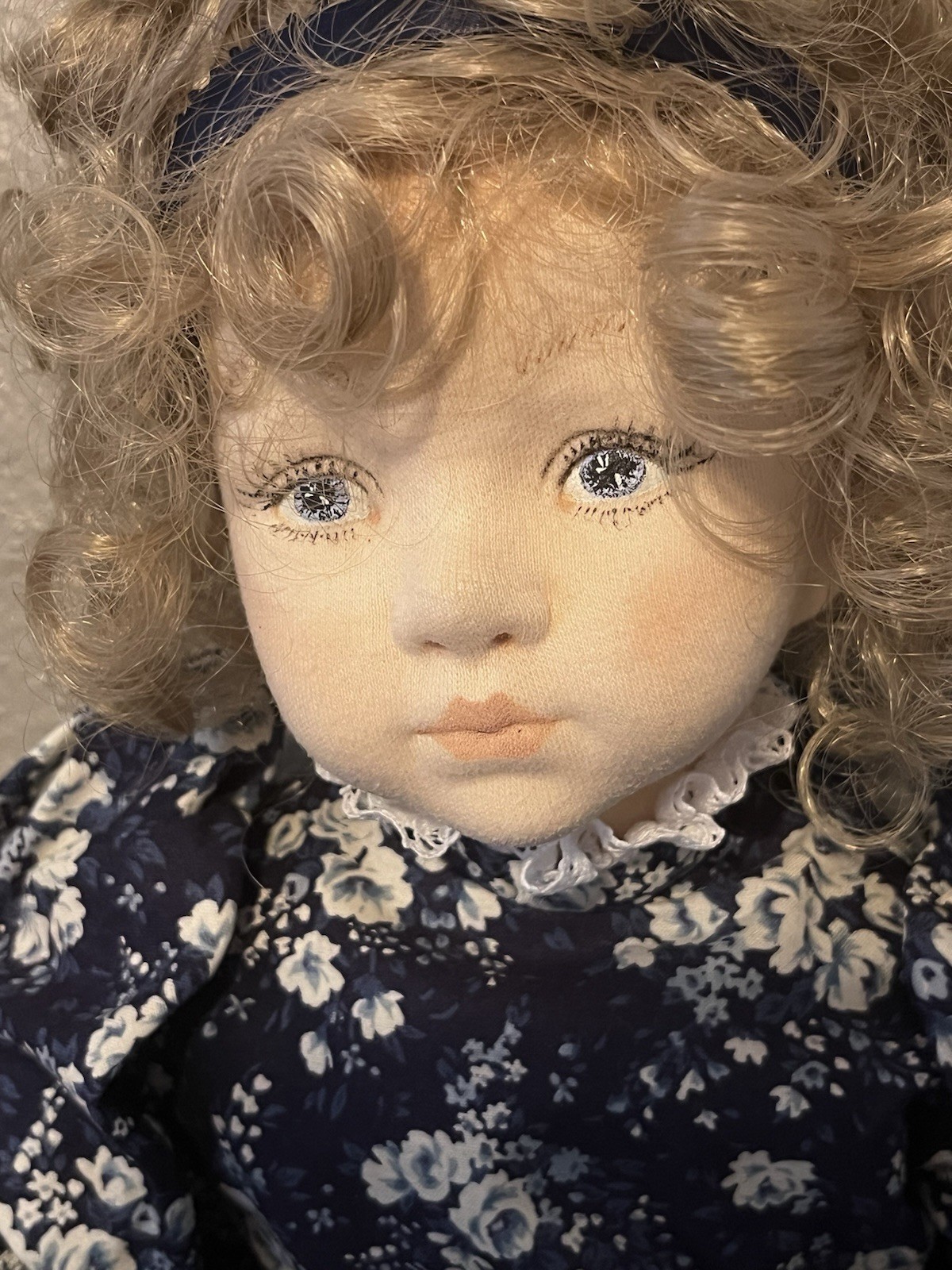 Victoria, doll by Edith Schmidt. Cloth covered porcelain head, handpainted.