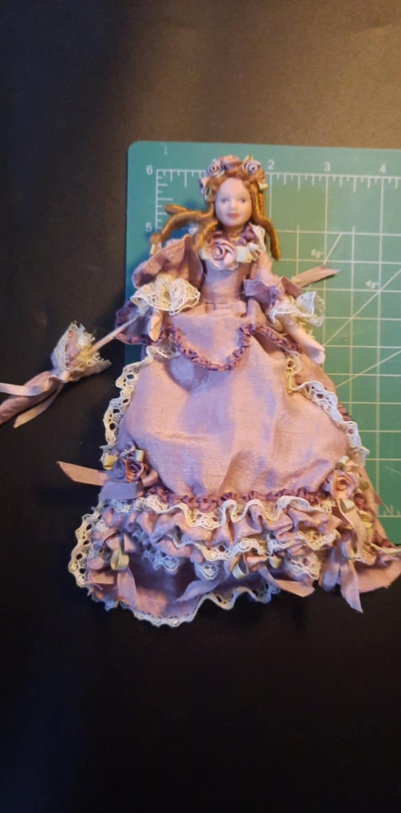 1:12 scale porcelain Victorian doll in beautiful dress with lace and roses
