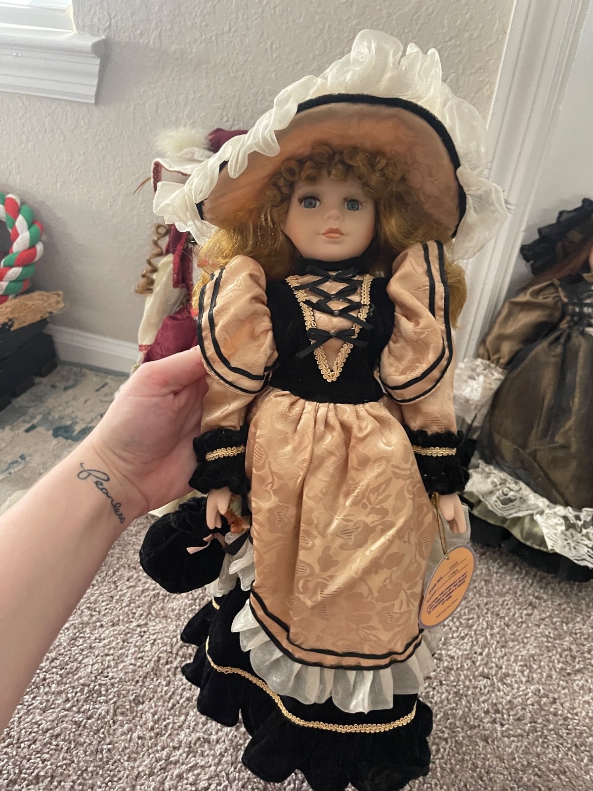 Early 2000s Emerald Doll Collection collectible porcelain doll named “CORA”, 18″