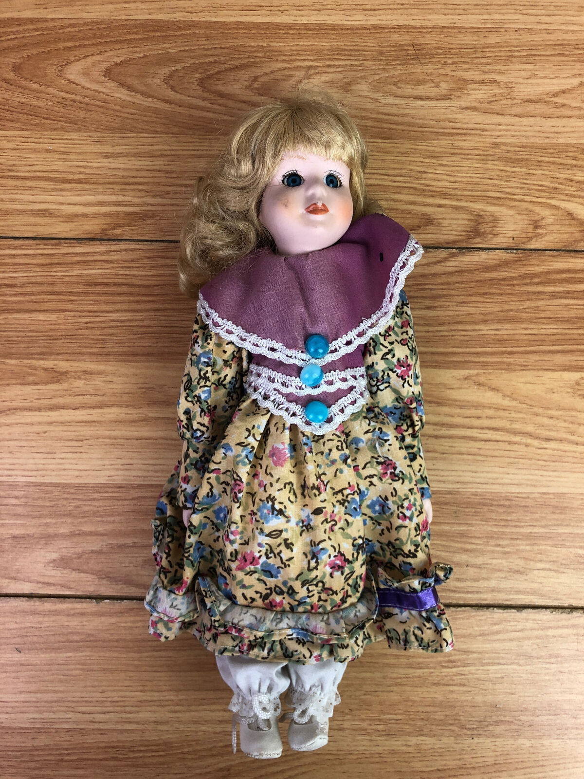 Porcelain Doll Girl With Blond Hair Multicoloured Floral Dress 11″