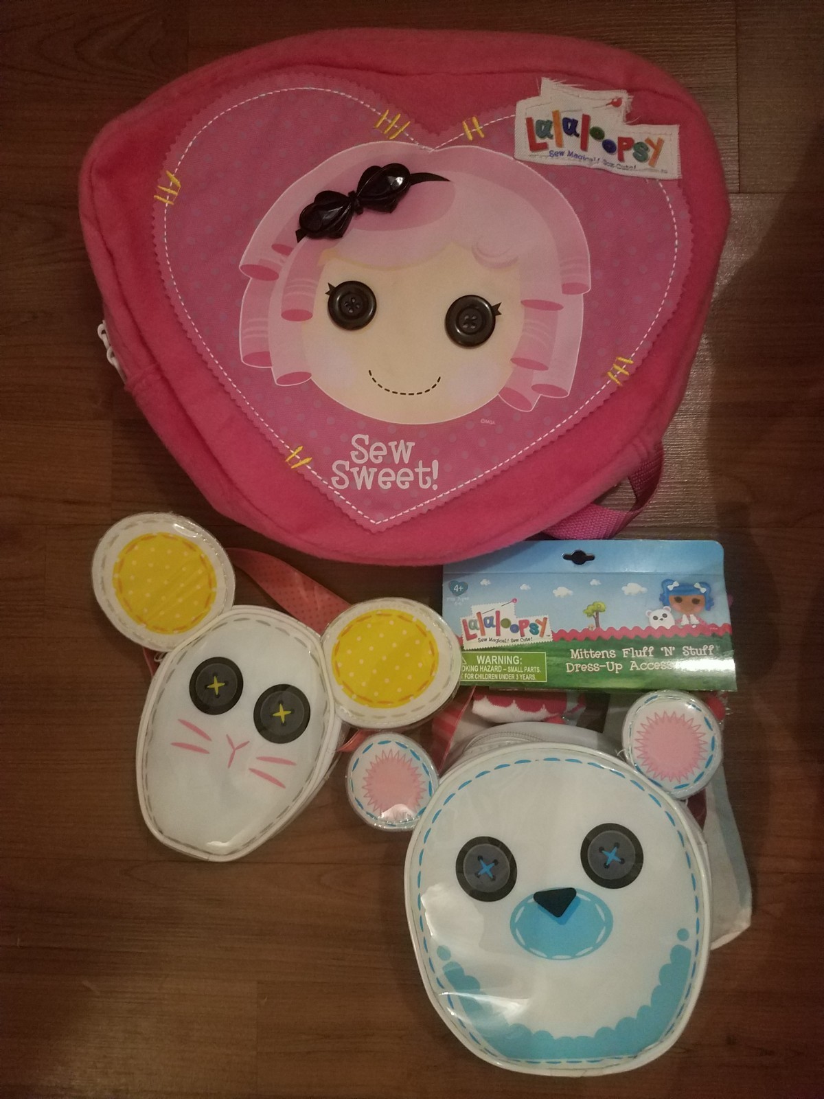 Lalaloopsy Themed Items. Three bags. Headphones. Soft Doll. Stickers.