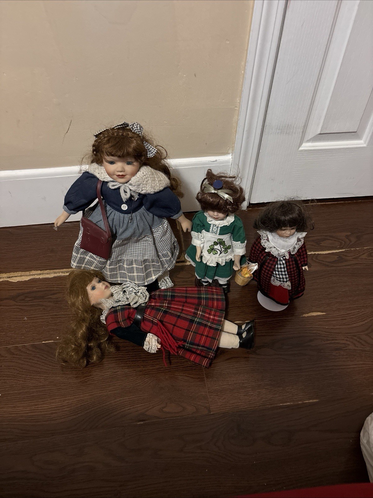 Source Unknown Porcelain Doll Collection with Blue and Green Outfits