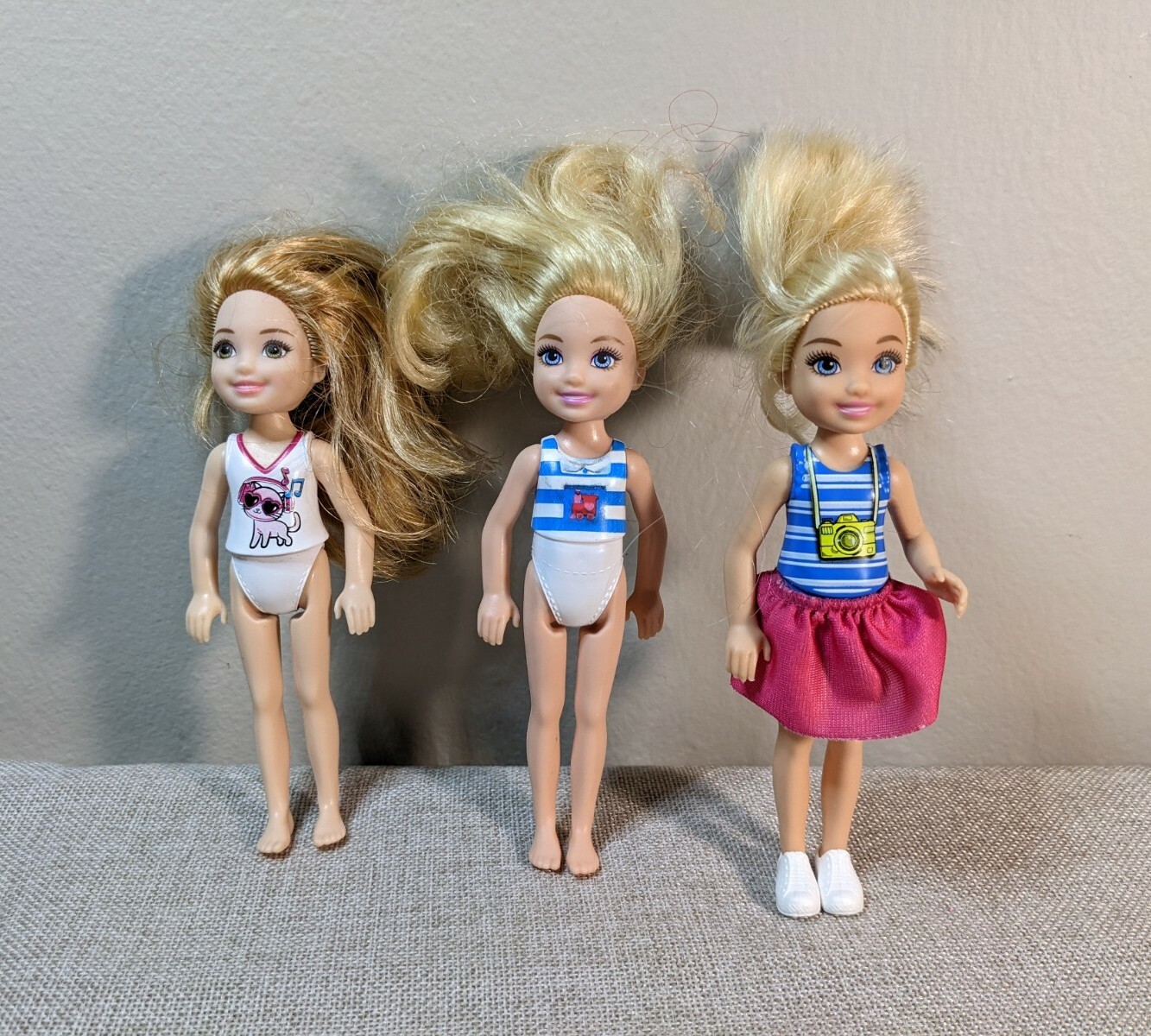 Lot of 3 Kelly Doll Barbie’s Sister Blond Hair Blue and Green Eyes