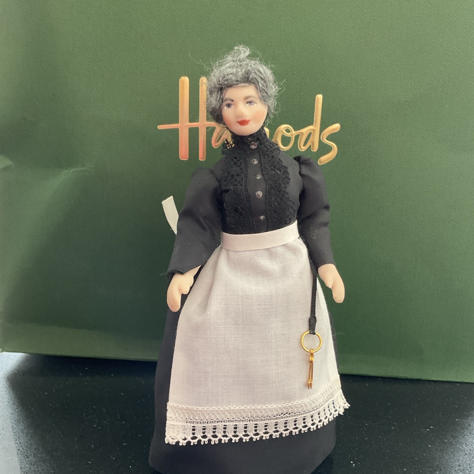 Dolls house miniatures 1:12 scale by Jill Nix Maid Black Dress White Apron Key